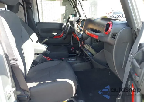 2015 Jeep Wrangler Unlimited Sport z USA, uszkodzony, nr VIN 1C4BJWDG7FL587014